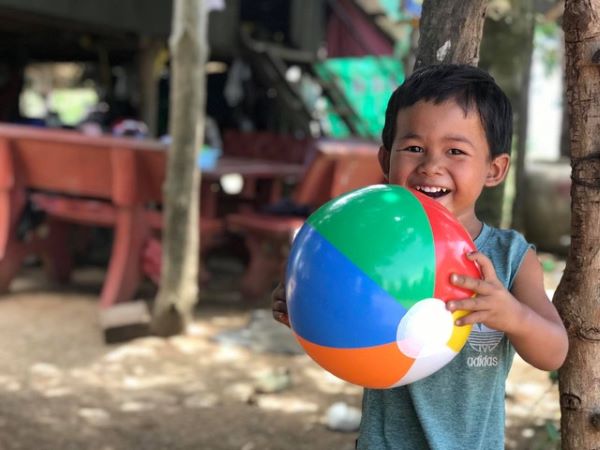 boy with beach ball, Cambodia