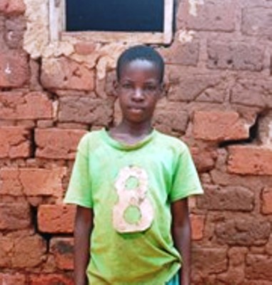 Ugandan boy wearing light green shirt