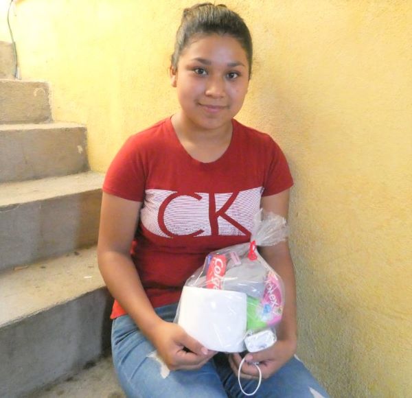 Girl in Guatemala with toiletries