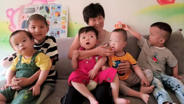 Foster mom with five children in China