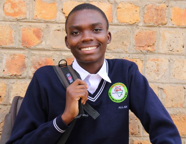 Uganda boy in school uniform
