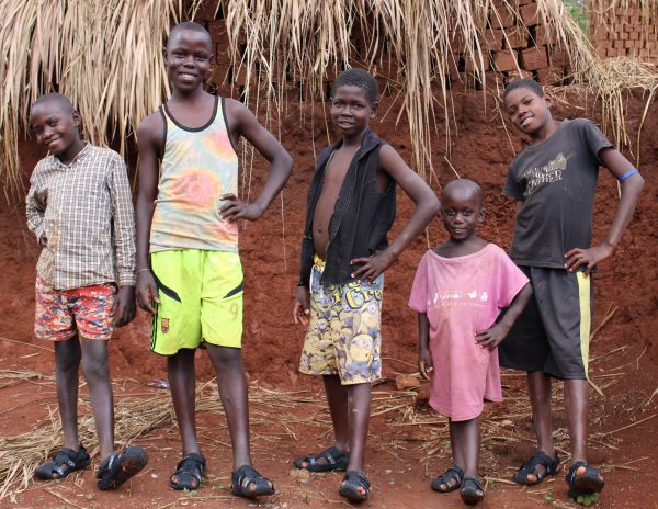 Five children in Uganda with new shoes