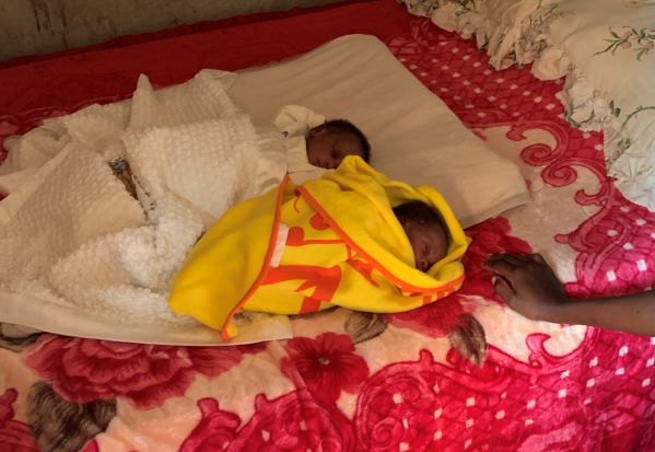 Uganda twins on a blanket
