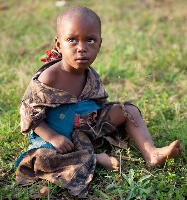 Child with bare feet in Uganda