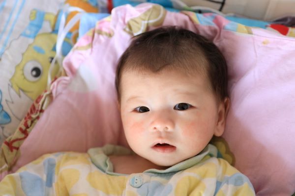 Baby girl in China with pneumonia