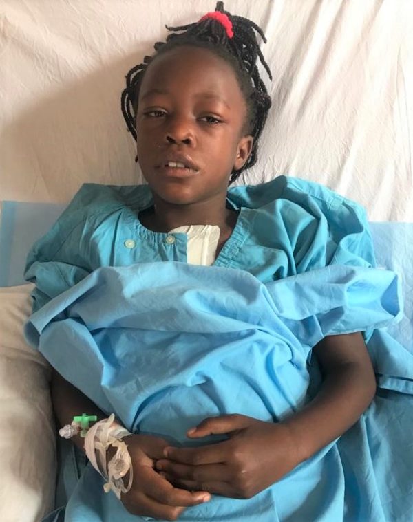Girl in blue recovering from heart surgery