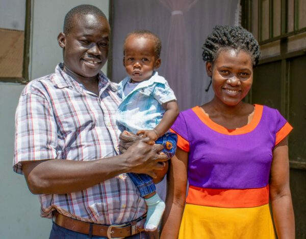 Baby boy waiting for heart surgery with his parents in Uganda