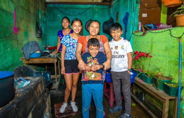 Mom with her two daughters and two sons at their home in Guatemala
