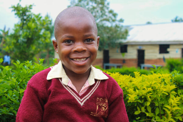 Boy smiling in school uniform