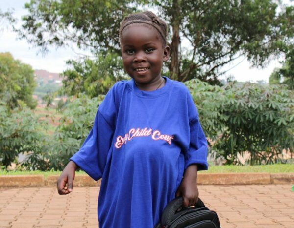 Ugandan girl wearing a blue shirt at a hernia medical mission
