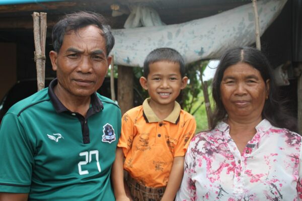 Boy and his parents in Cambodia 20 Years of Hope
