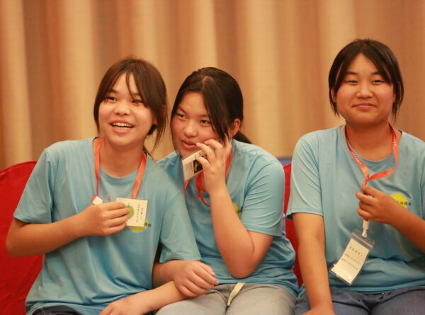 Three teen girls in China attend Life Skills Camp for Orphaned Teens