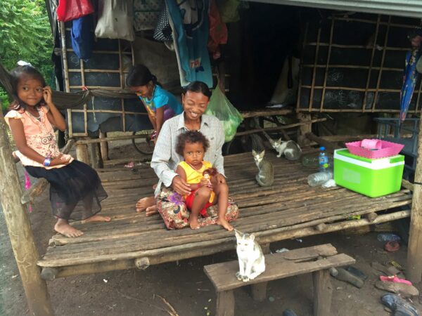 A family at their home in Cambodia