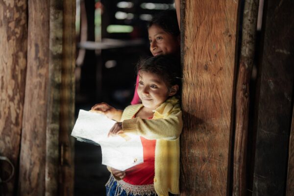 Mother and daughter with solar lights in Guatemala