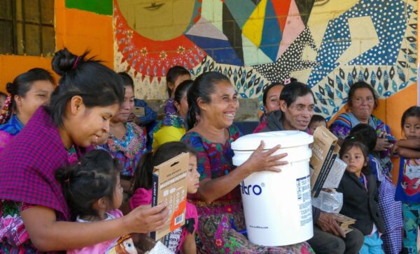 Families receive solar lights and filters in Guatemala