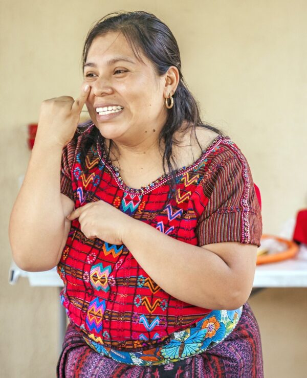 Woman in Guatemala using sign language
