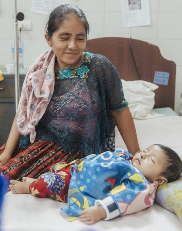 Mom and baby in hospital for cleft repair surgery