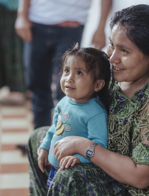 Toddler girl and her mom waiting for cleft palate surgery