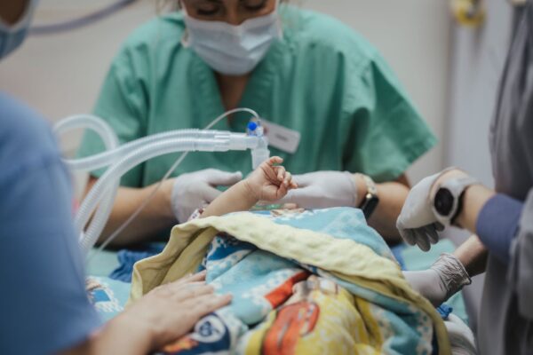 Baby on the operating table receiving cleft surgery