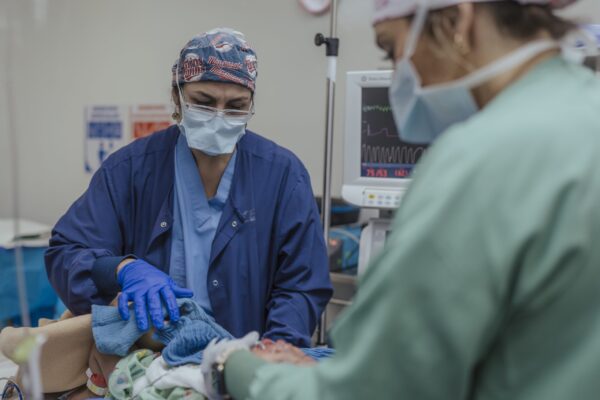 Nurses prep a patient for surgery