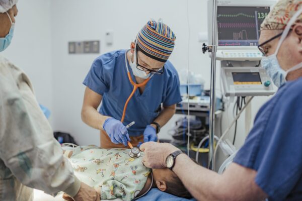 Doctors examine a patient